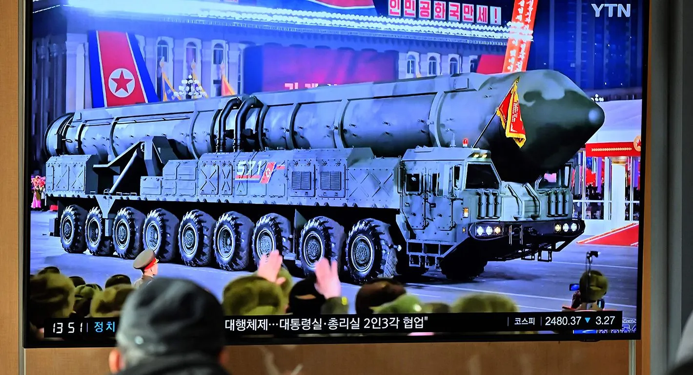 Simulation Models Predict Global Military Escalation