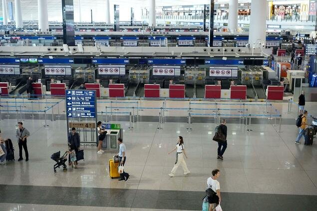 China Exit Restrictions Tighten Over Tech Security